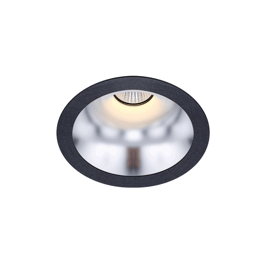 Black version of the Dea Amata M with silver reflector, a fixed recessed luminaire designed by Karizma Luce.