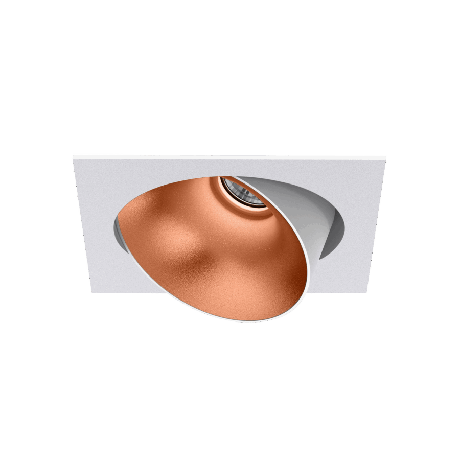 White version of the Dea Ceres M with copper reflector, an adjustable recessed luminaire designed by Karizma Luce.