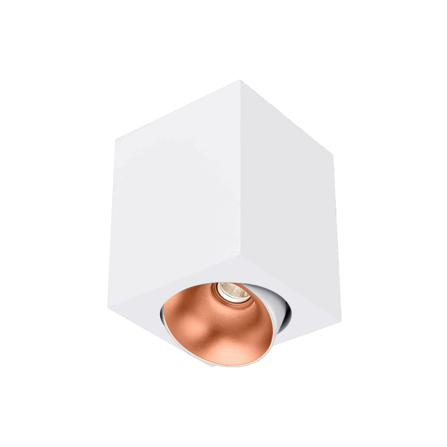 White version of the Dea Fauna M with copper reflector, a square surface-mounted luminaire designed by Karizma Luce.