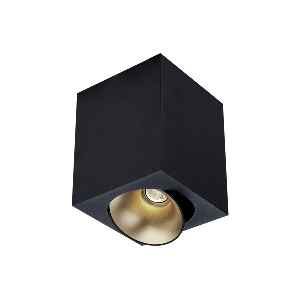 Black version of the Dea Fauna M with golden reflector, a square surface-mounted luminaire designed by Karizma Luce.
