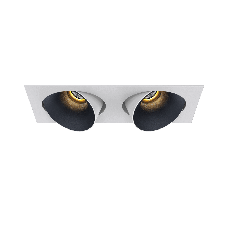 White version of the Dea Ceres M duo with black matt reflector, an adjustable recessed luminaire designed by Karizma Luce.