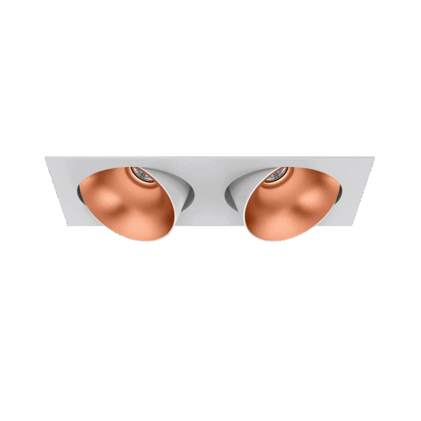 White version of the Dea Ceres M duo with copper reflector, an adjustable recessed luminaire designed by Karizma Luce.
