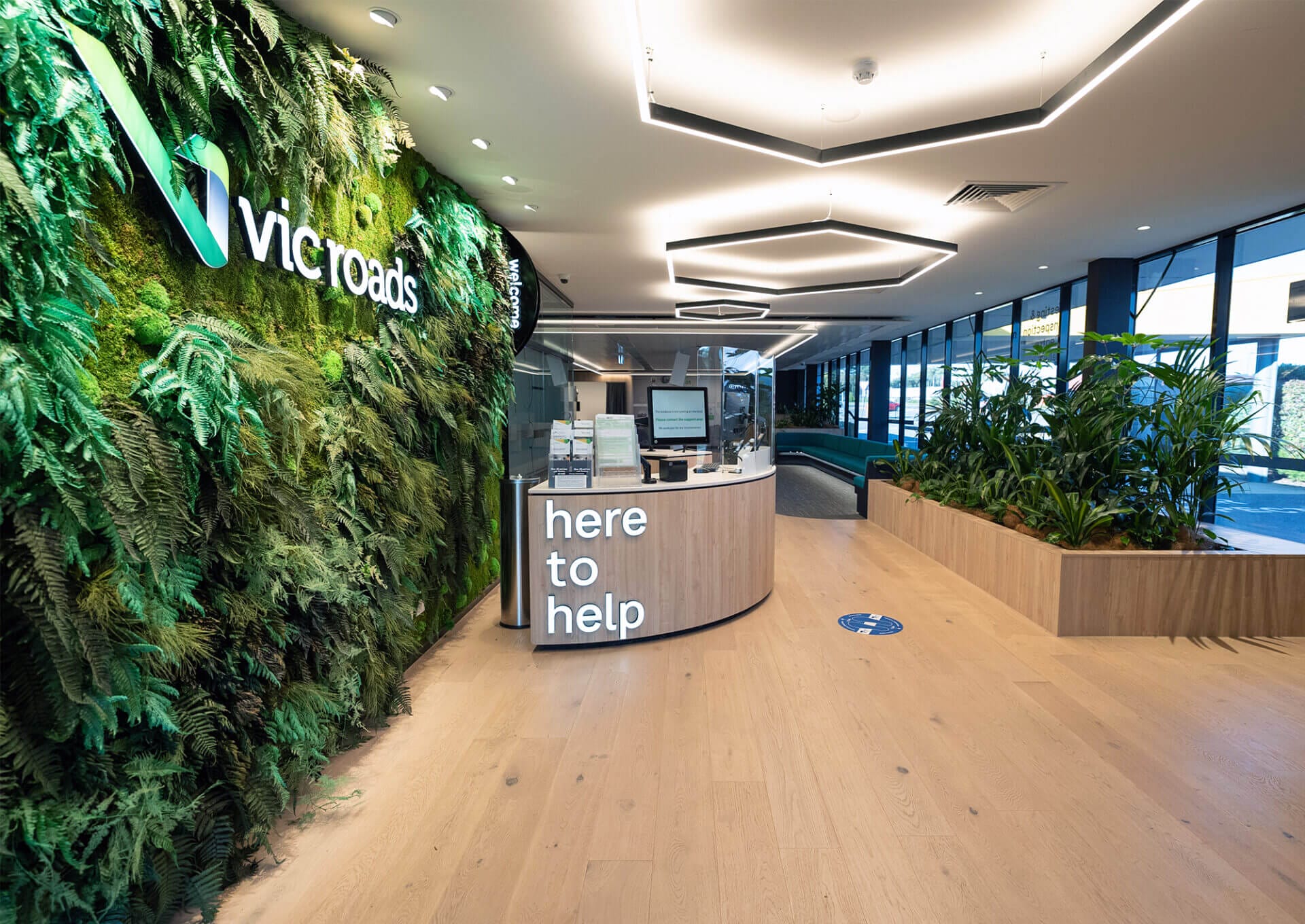 Coutner vic roads with fake green plants on walls