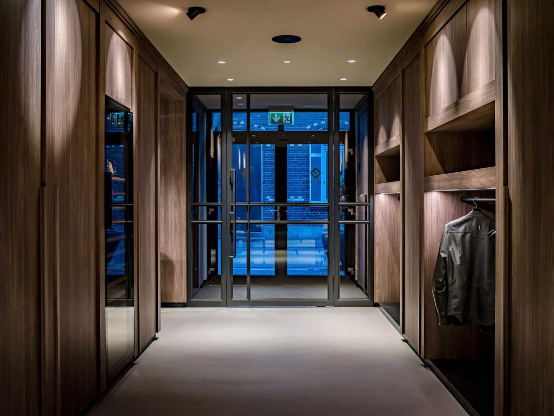 Entrance restaurant with jackets at night