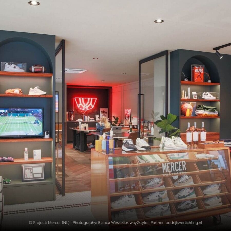 Shoe store Mercer with black Corsa in the ceiling.