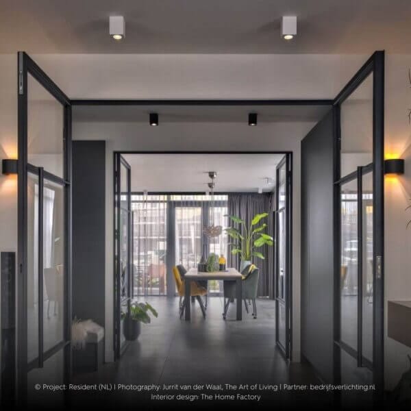 The Art of Living project. Resident with square surface Dea Fauna M luminaires in black and white.