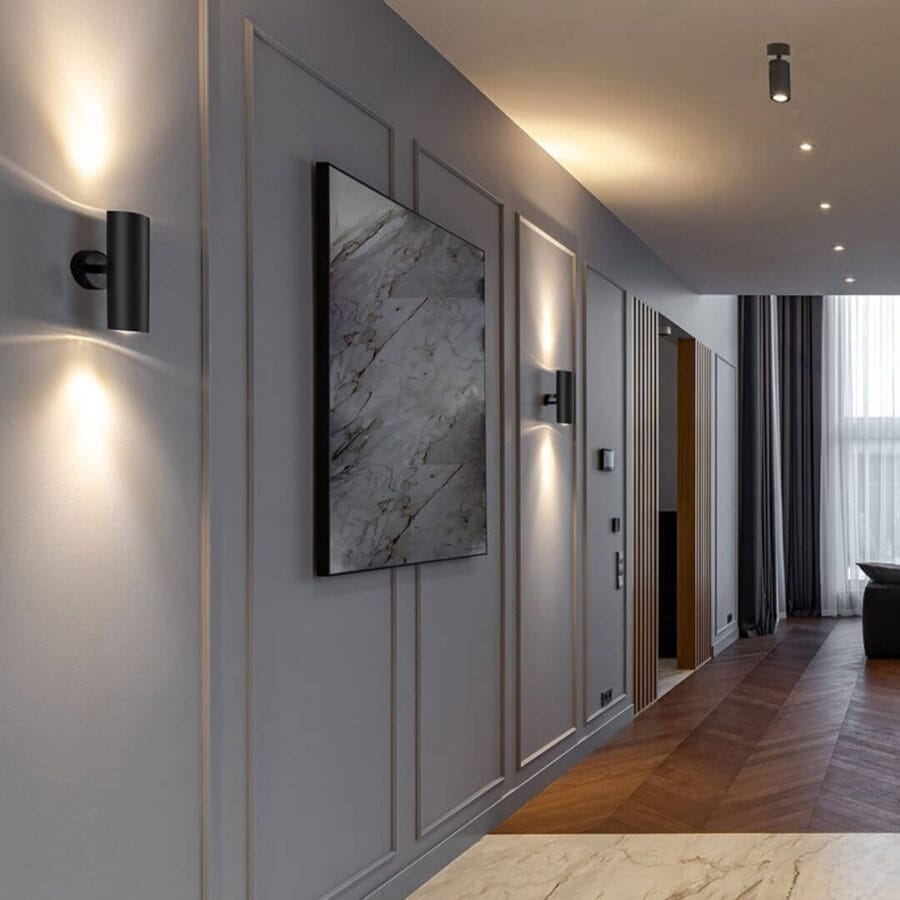 Wall with tube shaped Vuoto Wall lighting by Karizma Luce.