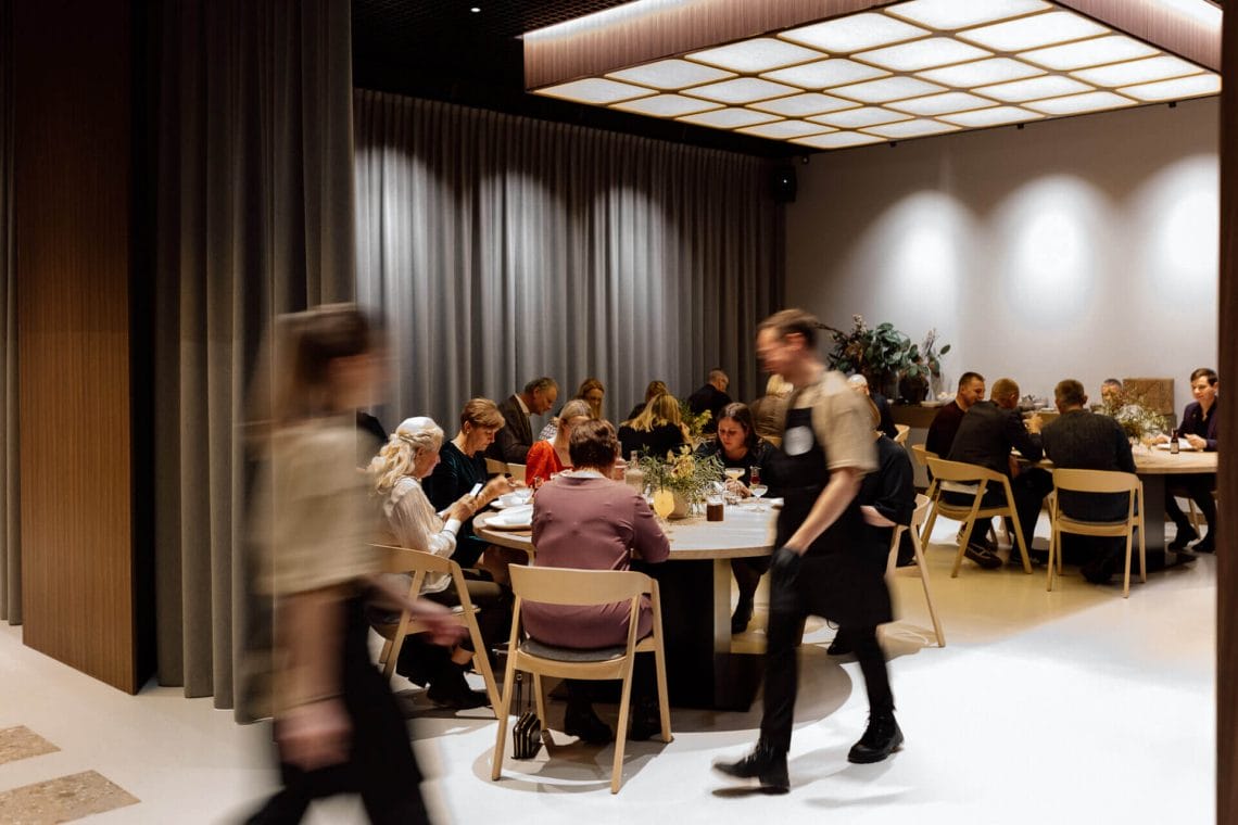 Busy restaurant with atmospheric lighting