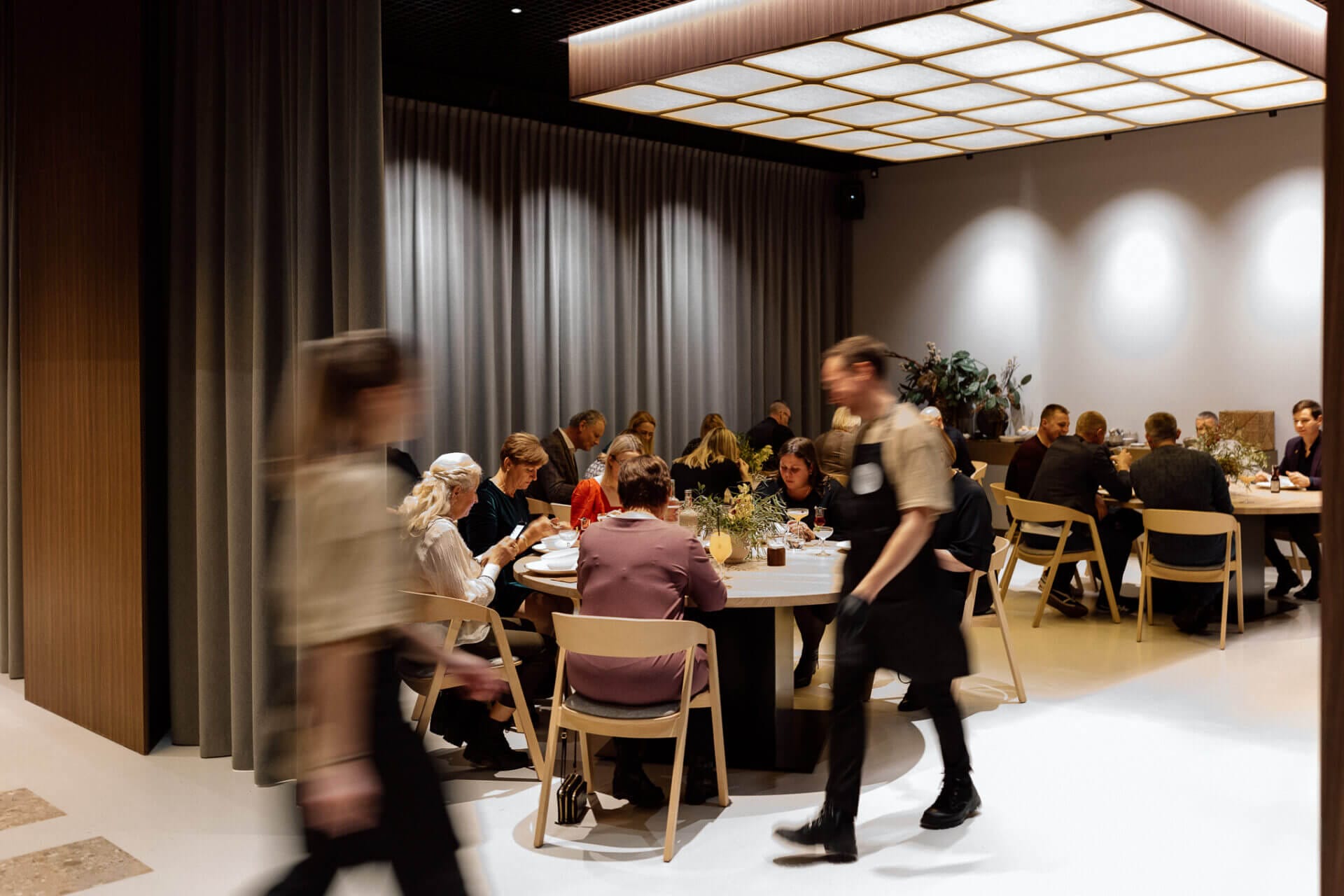 Busy restaurant with atmospheric lighting
