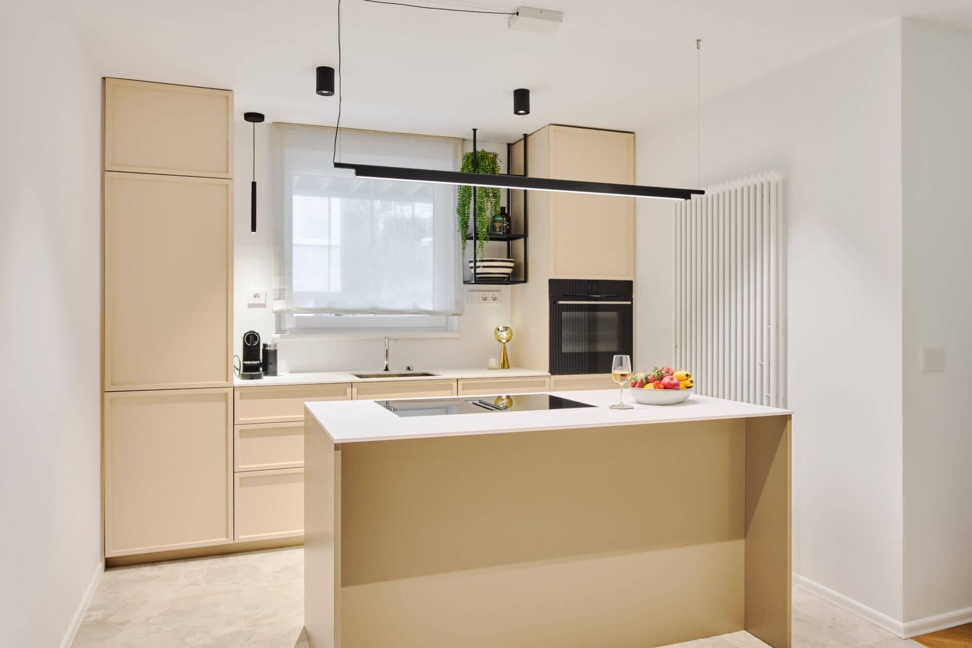 Modern kitchen in natural light colours and black accents